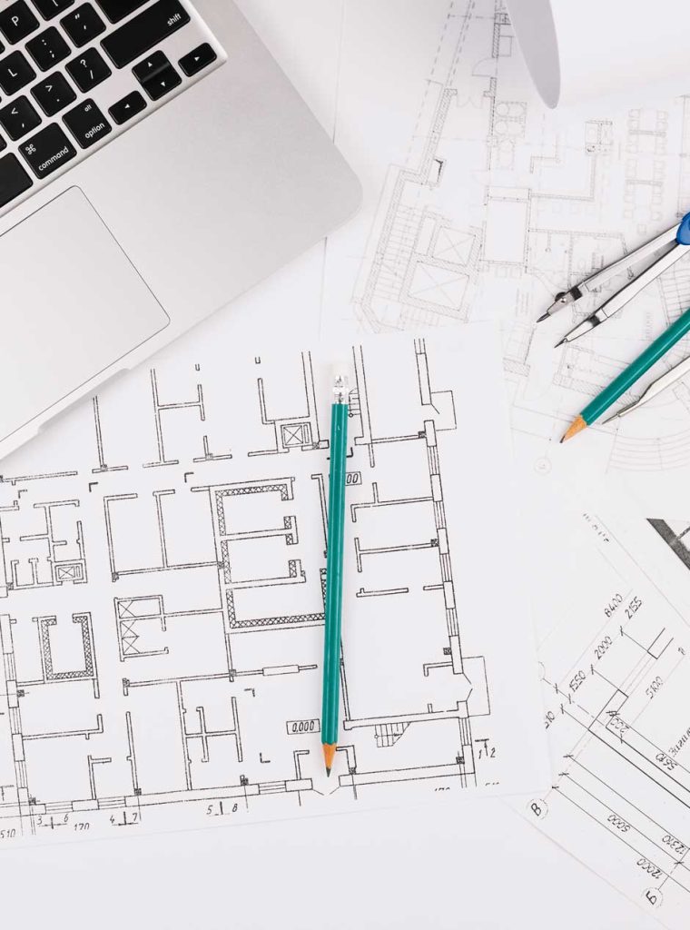 architecture-concept-with-building-plan-laptop
